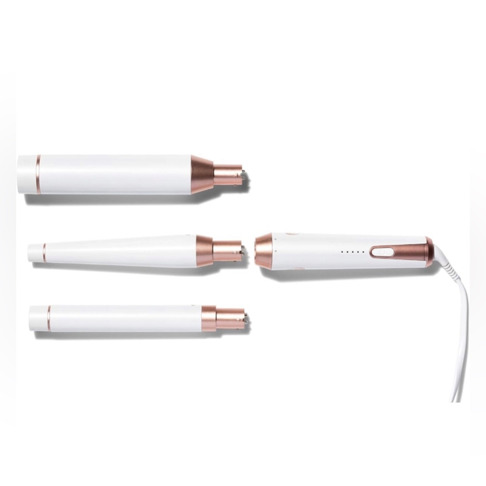 T3 Whirl Trio curling iron with 3 interchangeable barrels. Like New Condition